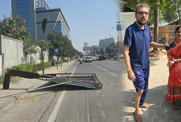 તંત્રની બેદરકારીઃ અમદાવાદમાં સિંધુ ભવન રોડ પર કોમનવેલ્થ ગેમ્સનું બેનર પડતા બે લોકોને ઈજા | Two peopl…