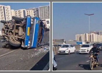 અમદાવાદમાં SG હાઈવેના સોલા બ્રિજ પર ટાયર ફાટતાં આઈસર પલટી, ભયંકર ટ્રાફિક જામ | Ahmedabad SG Highway …